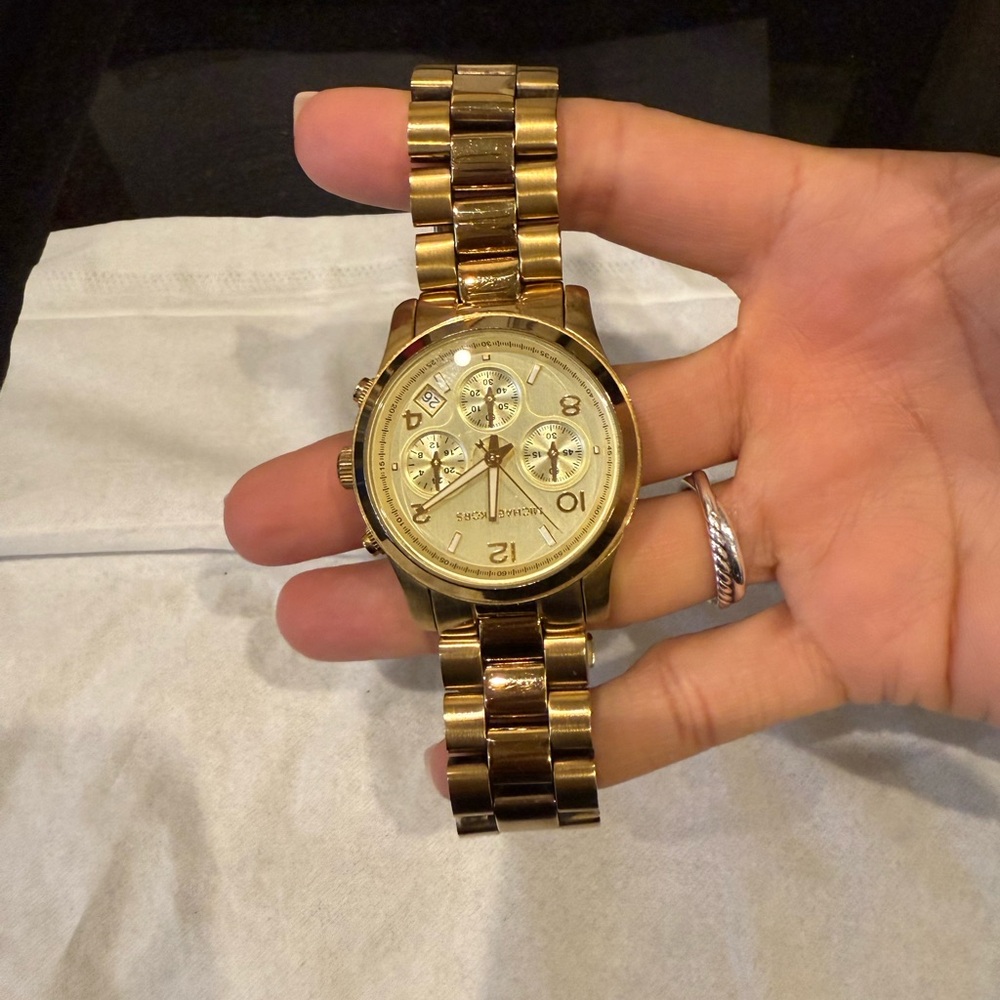 Michael Lord gold color watch